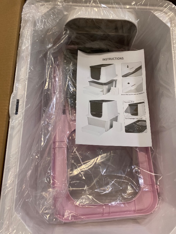 Photo 1 of RIZZARI Stainless Steel Cat Litter Box, Odorless Enclosed Litter Box with Top Holes, Large Litter Pan for Small to Large Sized Cats (Pink, 23.8" L*15.9" W*16.1" H)