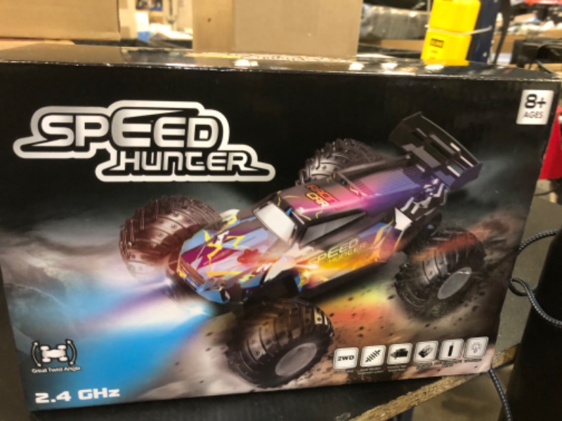 Photo 2 of AONEPTR Remote Control Car, All Terrain Remote Control Truck for Boy, 2.4GHz Rc Car with Bodylight and Two Rechargeable Batteries, 20KM/H Monster Truck Toys