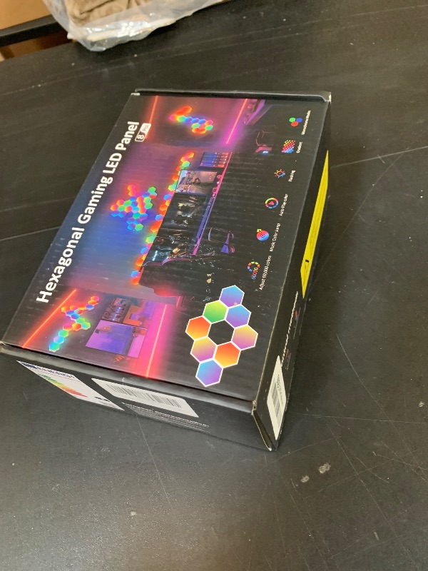 Photo 1 of OJQ 8 Pack Hexagon Wall Light RGB Panel - Smart APP RGB Hexagonal Modular Gaming Light Music with Sync Honeycomb Shape Panels Hexagon Lights for Bedroom Children Room