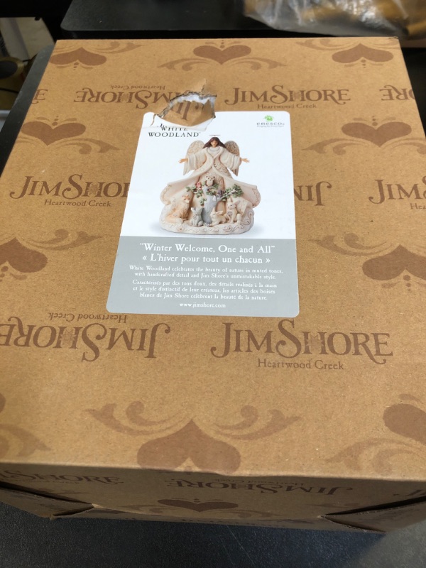 Photo 2 of Enesco Jim Shore Heartwood Creek Four Seasons White Woodland Angel with Coat Figurine, 9.5in H