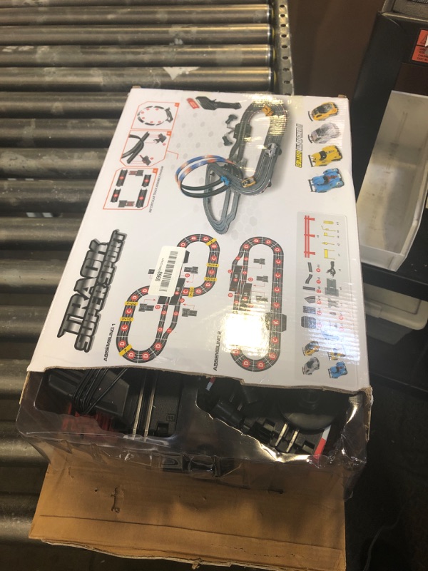 Photo 2 of Slot Car Race Track Sets, 19ft Electric Track with LED Lights and 4 Slot Cars, 2 Hand Controller and Racing Game Lap Counters, Race Track Set Features a Loop, Turns, and a Crossover for Boys Age 6-12