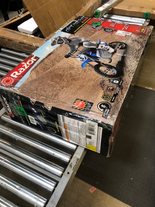 Photo 1 of Razor MX350 Dirt Rocket Electric Motocross Off-Road Bike for Age 13+, Up to 30 Minutes Continuous Ride Time, 12" Air-Filled Tires, Hand-Operated Rear Brake, Twist Grip Throttle, Chain-Driven Motor