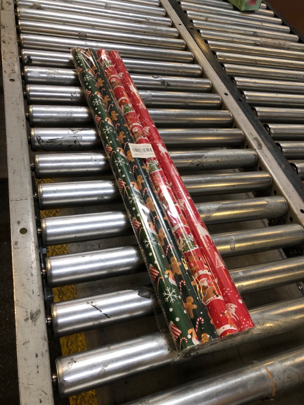 Photo 2 of Christmas Wrapping Paper (4 Rolls: 148 sq. ft. ttl) Funny Santas Claus with Gifts, Candy Cane, Reindeer, Christmas Tree, Snowflakes - Christmas Elements Collection - 30 inches x 14.8 feet Per Roll