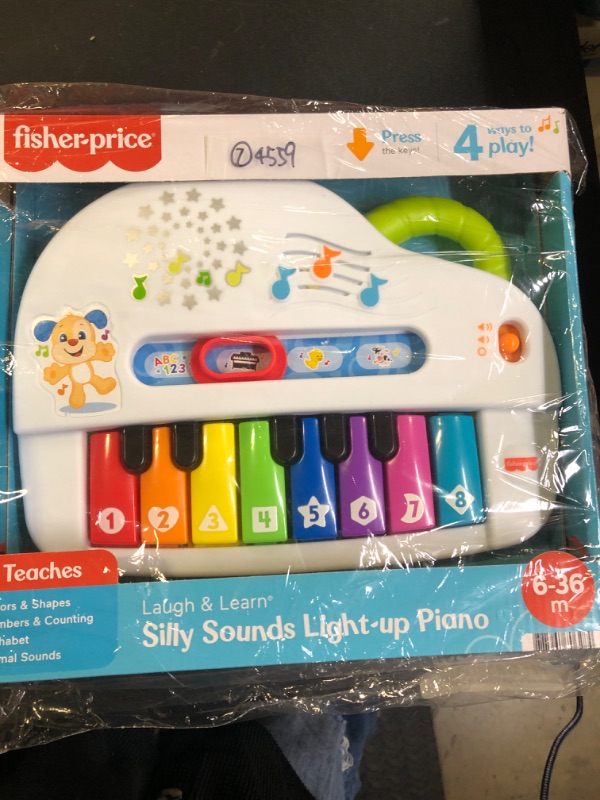 Photo 2 of Fisher-Price Baby Toy Laugh & Learn Silly Sounds Light-Up Piano Musical Instrument with Learning Songs for Infants Ages 6+ Months?