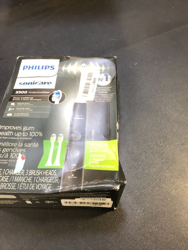 Photo 2 of Philips Sonicare ProtectiveClean 5300 Rechargeable Electric Toothbrush, with Pressure Sensor, 3 Cleaning Modes, SmarTimer and QuadPacer, with 2 Bonus Brush Heads, Travel Case, Black, Model HX6423/34