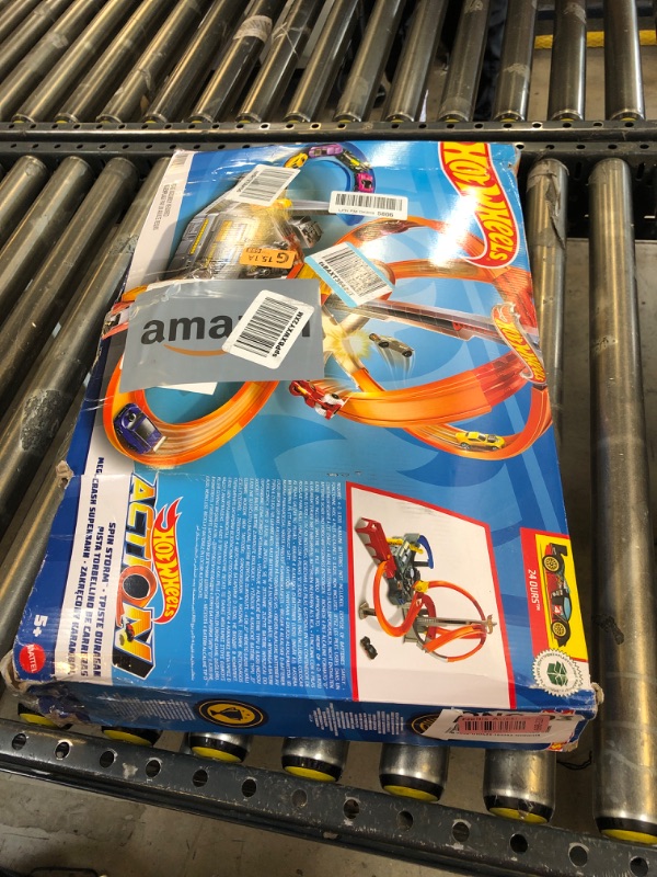 Photo 1 of Hot Wheels Track Set Spin Storm, 3 Intersections for Crashing & Motorized Booster, 1:64 Scale Toy Car (Amazon Exclusive)