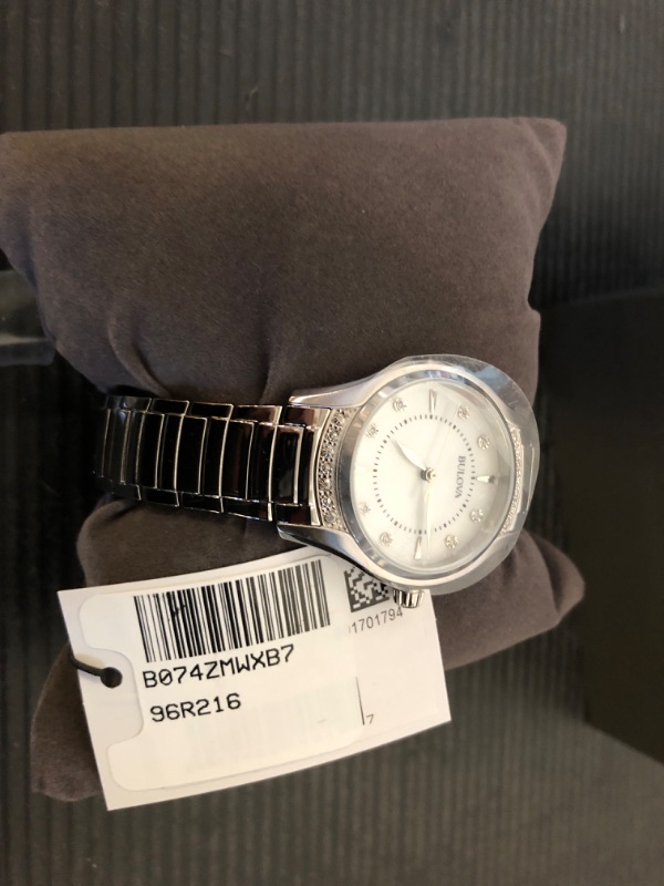 Photo 2 of Bulova Ladies' Classic Diamond 3-Hand Quartz Stainless Steel Watch, 16 Diamonds, Mother-of-Pearl Dial, Curved Mineral Crystal, Silver Tone