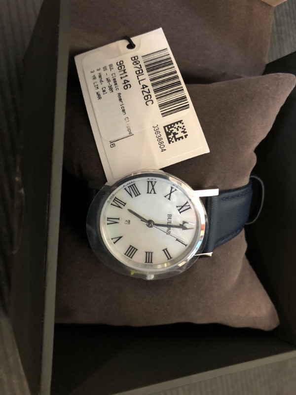 Photo 2 of Bulova Ladies Classic Stainless Steel 3-Hand Date Quartz Slim Watch with Blue Leather Strap, Silver-Tone, 32mm Style: 96M146