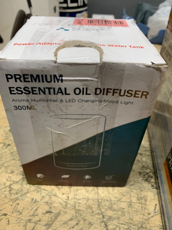 Photo 1 of ASAKUKI 300ML Essential Oil Diffuser, Quiet 5-in-1 Premium Humidifier, Home Fragrance Aroma Diffuser with 7 LED Color Changing Light and Auto-Off Switch -Light Brown