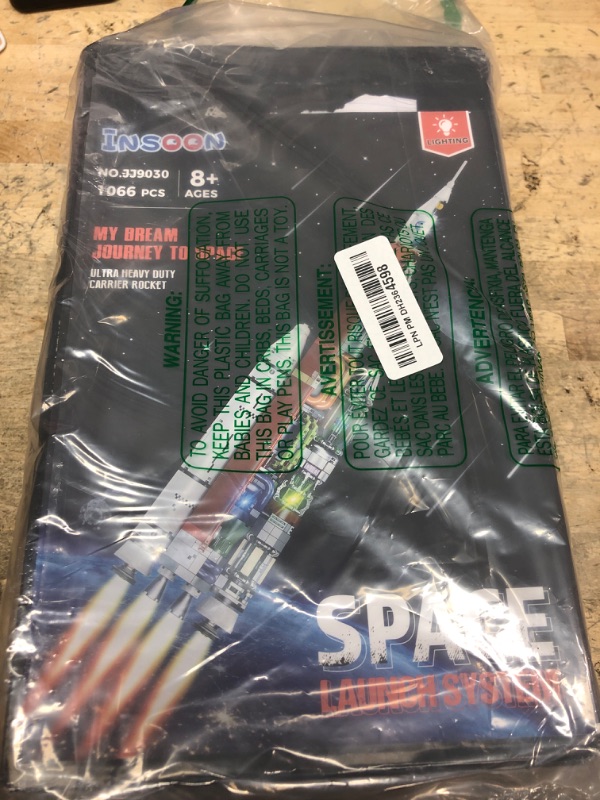 Photo 1 of INSOON Space Rocket Building Set with Lights Stand, 1055 PCS Detachable Space Exploration Building Block Toy, Launch Rocket Model for Home, Gift for Adults Kids Boys Girls Ages 8 9 10 11 12 +