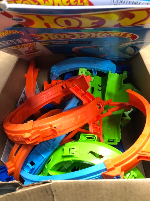 Photo 1 of Hot Wheels Track Set with 4 Loops, 3-Way Crash Zone & Motorized Booster, Folds for Storage, with 1:64 Scale Toy Car