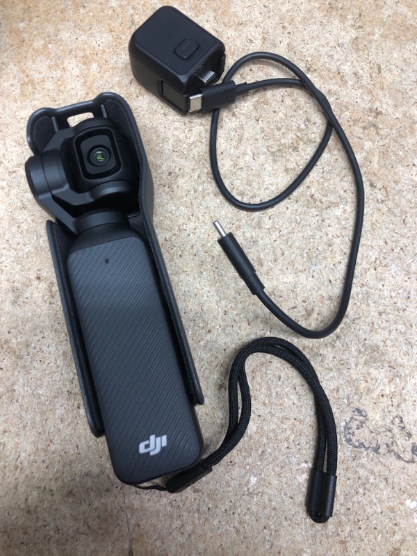 Photo 1 of DJI Osmo Pocket 3, Vlogging Camera with 1'' CMOS & 4K/120fps Video, 3-Axis Stabilization, Fast Focusing, Face/Object Tracking, 2" Rotatable Touchscreen, Digital Camera for Photography, YouTube