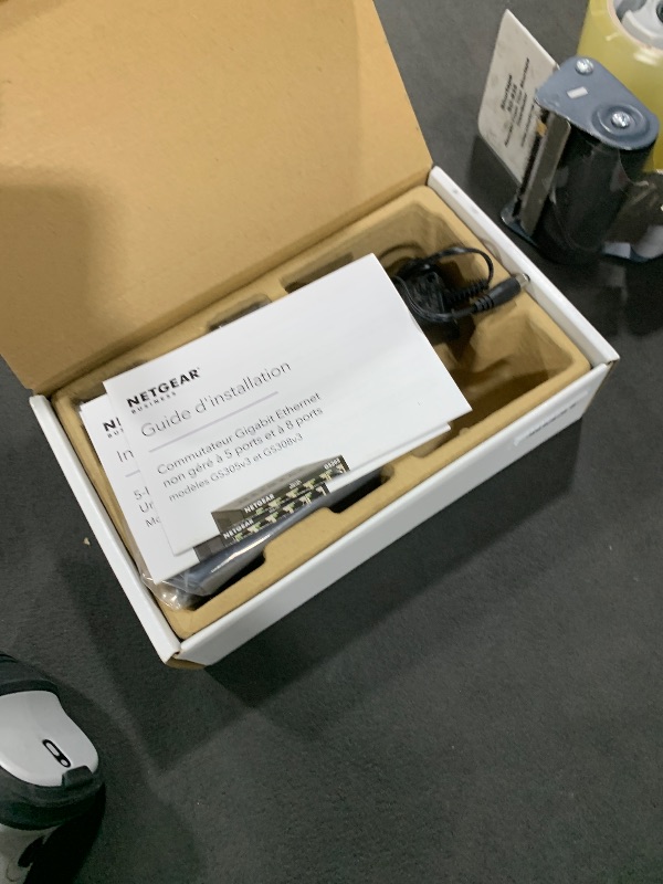 Photo 1 of NETGEAR 5-Port Gigabit Ethernet Unmanaged Essentials Switch (GS305) - Home Network Hub, Office Ethernet Splitter, Plug-and-Play, Silent Operation, Desktop or Wall Mount