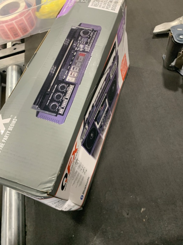 Photo 1 of QFX J-220BT Purple Boombox MP3 Conversion from Radio to Cassette with 4-Band (AM, FM, SW1, SW2) Radio with Bluetooth, Dual 3” Speakers, Built-in Microphone, Recorder, and a 3-Band Equalizer