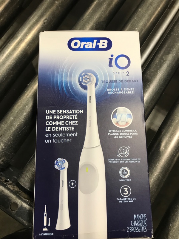 Photo 1 of Oral-B iO Series 2 Rechargeable Electric Powered Toothbrush Starter Kit, Pure White with 2 Brush Heads - Automatic Pressure Sensor to Protect Gums - 3 Modes - 2 Min Timer