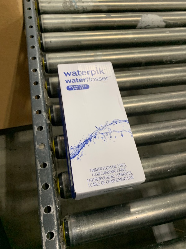 Photo 1 of Waterpik Cordless Pulse Rechargeable Portable Water Flosser for Teeth, Gums, Braces Care 