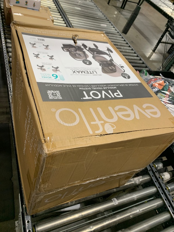 Photo 1 of Evenflo Pivot Modular Travel System with LiteMax Infant Car Seat with Anti-Rebound Bar (Desert Tan)