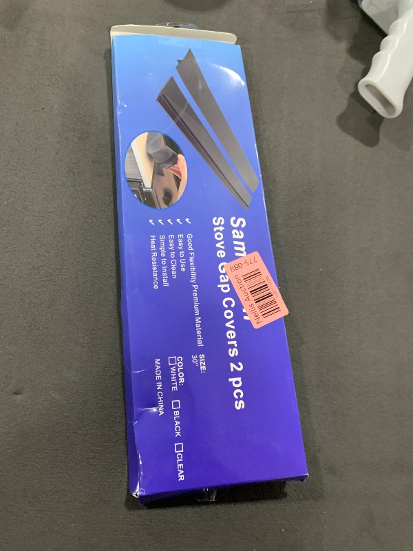 Photo 1 of Silicone Stove Counter Gap Cover (2 Pack),Easy Clean Heat Resistant Wide & Long Kitchen Stove Gap Filler,Seals Spills Between Counters, Oven, Stovetops, Washing Machines, Washer, Dryer(30 in, Black)