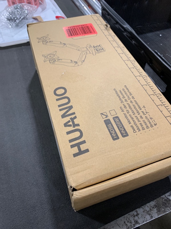 Photo 1 of HUANUO Dual Monitor Stand - Full Adjustable Monitor Desk Mount Swivel Vesa Bracket with C Clamp, Grommet Mounting Base for 13 to 32 Inch Computer Screens - Each Arm Holds 4.4 to 19.8lbs