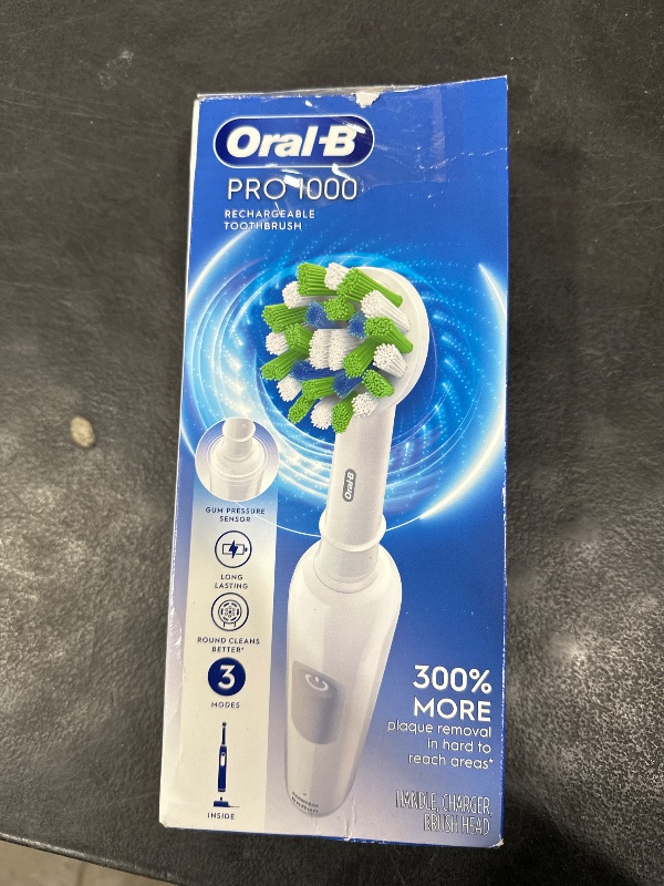 Photo 1 of Oral-B Pro 1000 Rechargeable Electric Toothbrush, White