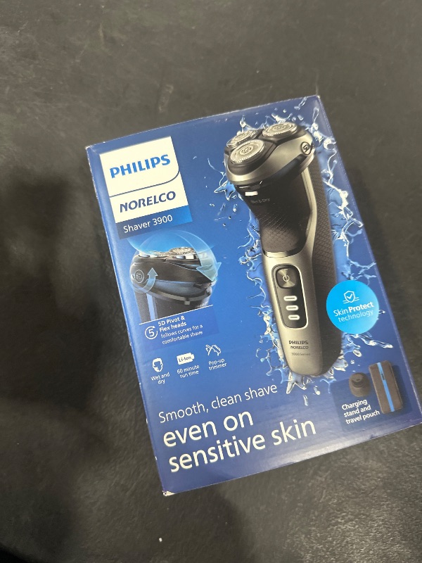 Photo 1 of Philips Norelco Shaver 3900 Series, Wet and Dry Electric Shaver, P-Cap, Travel Pouch, Charging Stand, Storm Blue, Model S3341/92