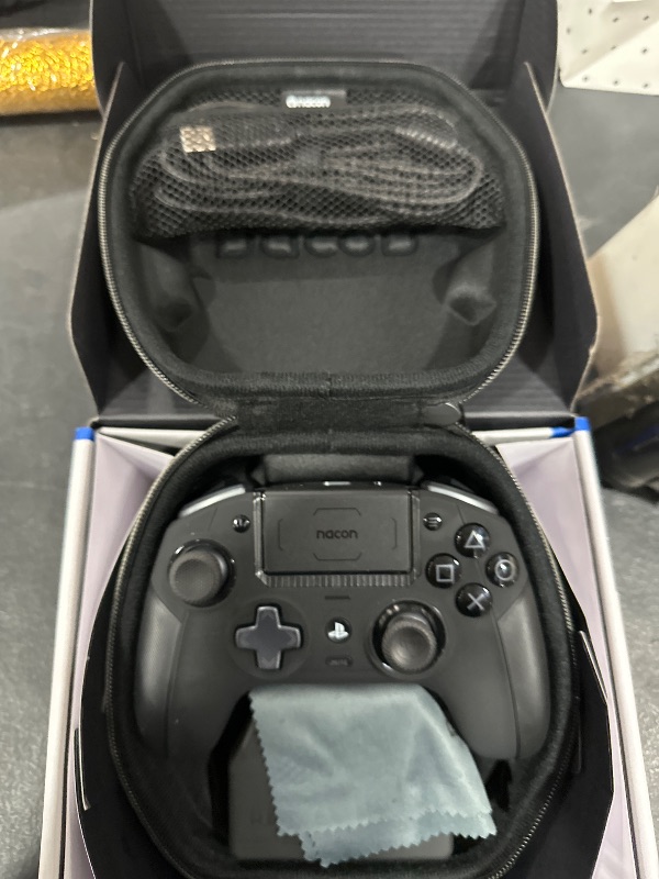 Photo 1 of NACON Revolution 5 Pro Officially Licensed PlayStation Wireless Gaming Controller for PS5 / PS4 / PC - Hall Effect, Trigger Stops, Mappable Buttons, Bluetooth Audio - Triple Black