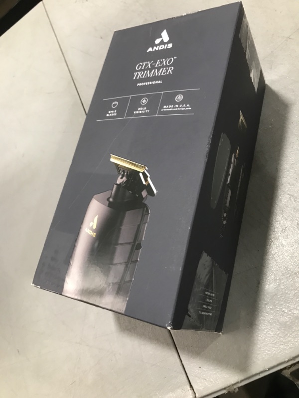 Photo 1 of Andis 74150 GTX-EXO Professional Cord/Cordless Lithium-ion Electric Beard & Hair Trimmer with Charging Stand, Black