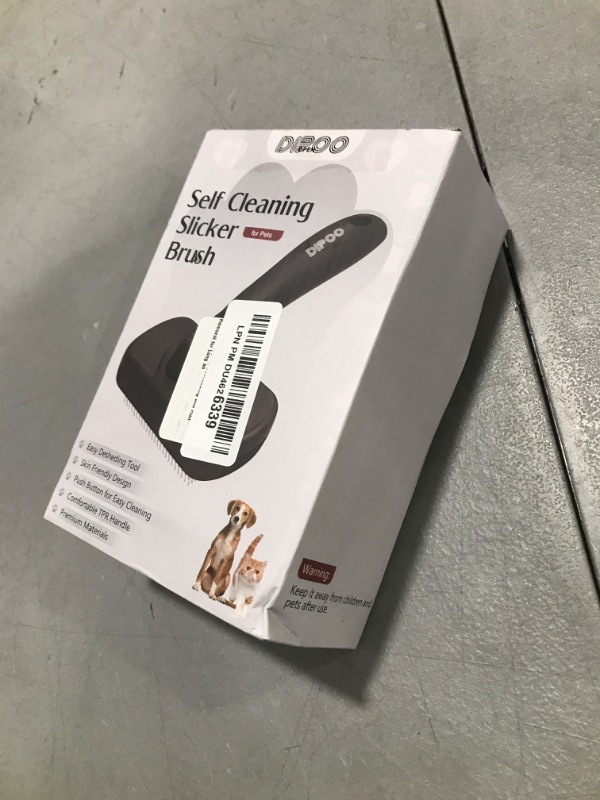 Photo 1 of Dipoo Self Cleaning Shedding Brush - Skin Friendly Grooming Tool for Dogs, Cats, and Puppies, Deshedding and Hair Removal for Long and Short Haired Pets, Black