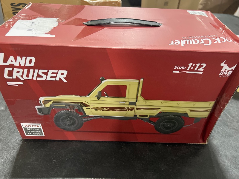 Photo 1 of MN82 RC Rock Crawler, 2.4Ghz Toyota Remote Control Truck, 4WD 2 Speeds Switch RC Crawler Off-Road Pick-up with 2 Upgraded 1200mah Battery, 1/12 Scale Trucks (with Gift)