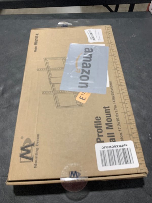 Photo 1 of Mounting Dream TV Mount Fixed for Most 42-84 Inch Flat Screen TVs, TV Wall Mount Bracket up to VESA 600 x 400mm and 132 lbs - Fits 16"/18"/24" Studs - Low Profile and Space Saving MD2163-K