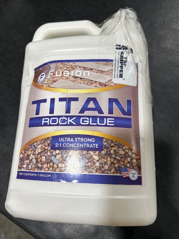 Photo 1 of Titan Rock Glue for Landscaping - Stone Glue for Outside Rocks, Small Pebbles, & Pea Gravel, Gravel Binder, Pathway Stabilizer, Long-Lasting Formula, Prevents Erosion (128 Fl Oz) by Fusion Chemical