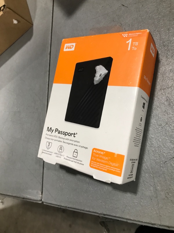Photo 1 of WD 1TB My Passport, Portable External Hard Drive, Black, backup software with defense against ransomware, and password protection, USB 3.1/USB 3.0 compatible - WDBYVG0010BBK-WESN
