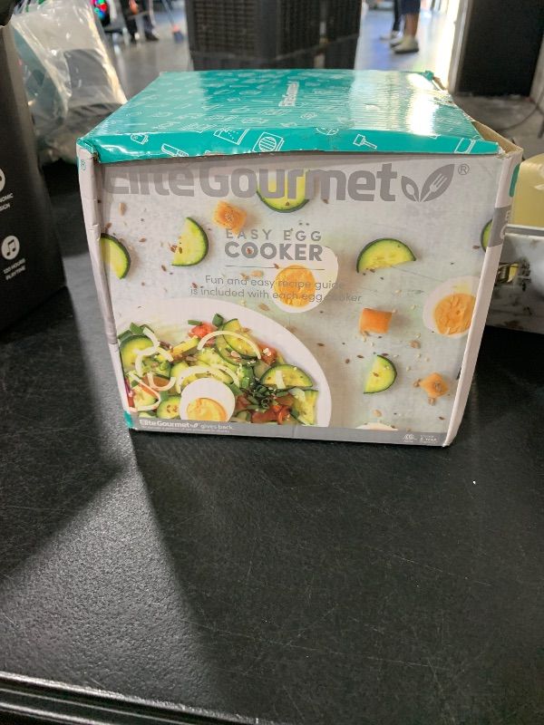 Photo 1 of Elite Gourmet EGC322CW Easy Egg Cooker Electric 7-Egg Capacity, Soft, Medium, Hard-Boiled Egg Cooker with Auto Shut-Off, Measuring Cup Included, BPA Free, Classic White
