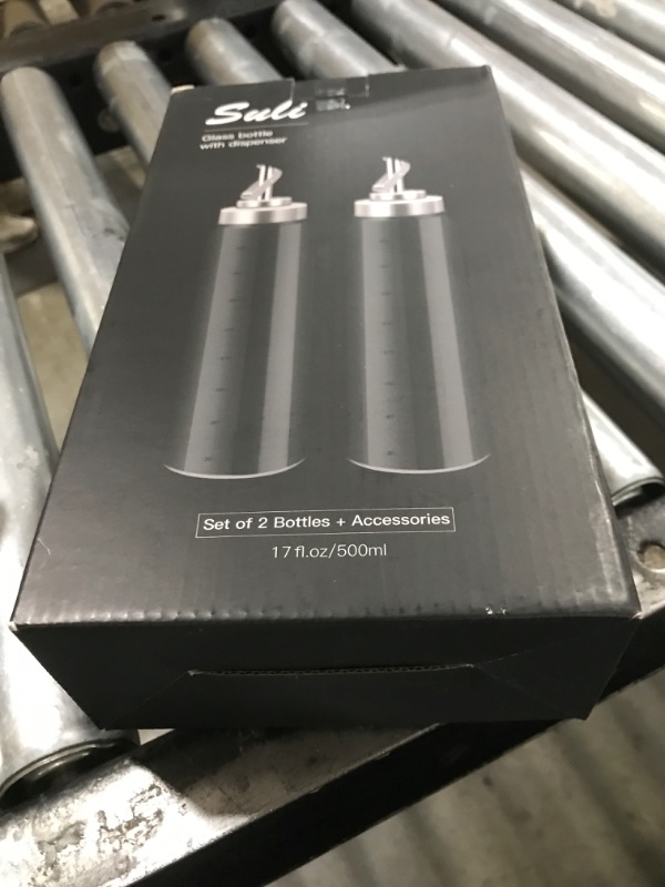Photo 1 of Suli Glass Olive Oil Dispenser Bottle -2 Pack17oz Oil and Vinegar Cruet Set with Steel Spouts and Labels for Kitchen Cooking, Salad Dressing, and BBQ (Silver)