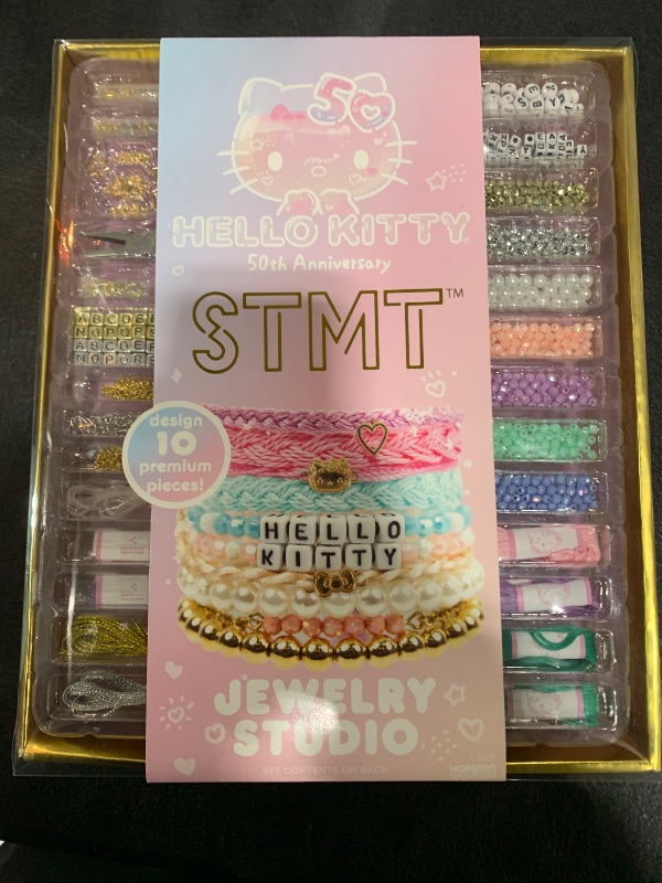 Photo 1 of Official Sanrio Hello Kitty 50th Anniversary Jewelry Studio by STMT, Design 10 Hello Kitty Accessories, Includes Charms, Chains & Supplies, Collectible Sanrio Stuff, Jewelry Making Kit for Girls 8-12