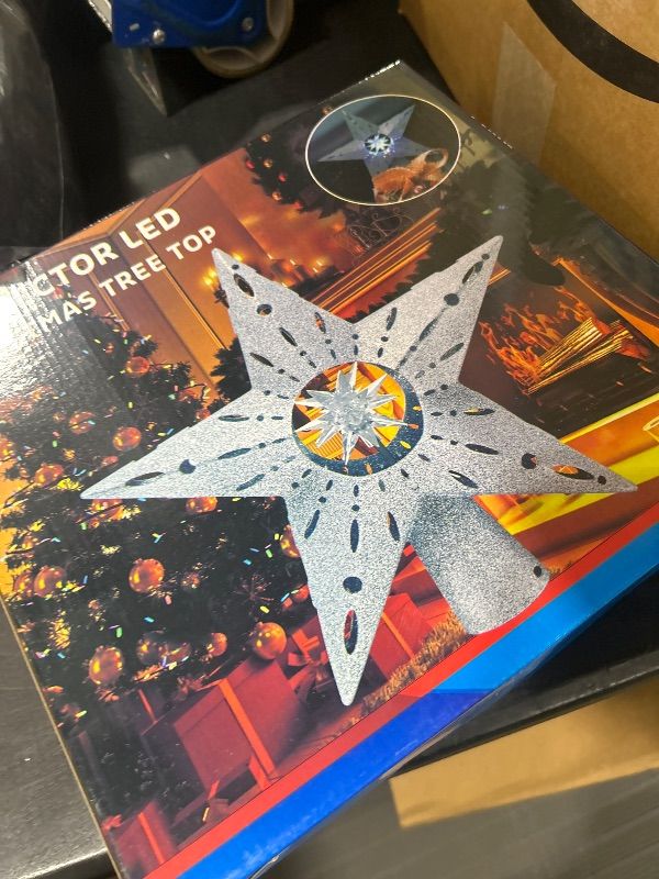 Photo 1 of TEPENAR Christmas Tree Topper Star: 12.2" Xmas Tree Topper Lighted with Automatic Rotating Multicolor 3D Magical Glitter Star Tree Toppers Lights for Home Office Xmas Holiday Decor - Silver