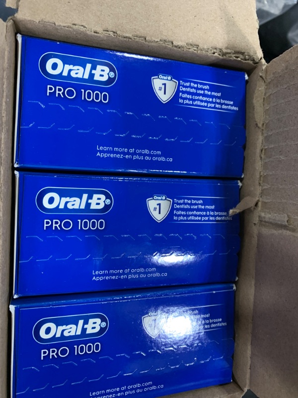 Photo 3 of (3 PACK) Oral-B Pro 1000 Rechargeable Electric Toothbrush, White