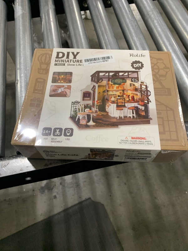 Photo 1 of Rowood Miniature House Kit,DIY Miniature Dollhouse Kits for Adults to Build to Live in,Mayberry Street Miniatures,Wooden Adults Craft Kits,Mini Model Kits with LED,Birthday for Teens(NO.17 Cafe)