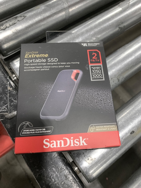 Photo 2 of SanDisk 2TB Extreme Portable SSD - Up to 1050MB/s, USB-C, USB 3.2 Gen 2, IP65 Water and Dust Resistance, Updated Firmware - External Solid State Drive - SDSSDE61-2T00-G25