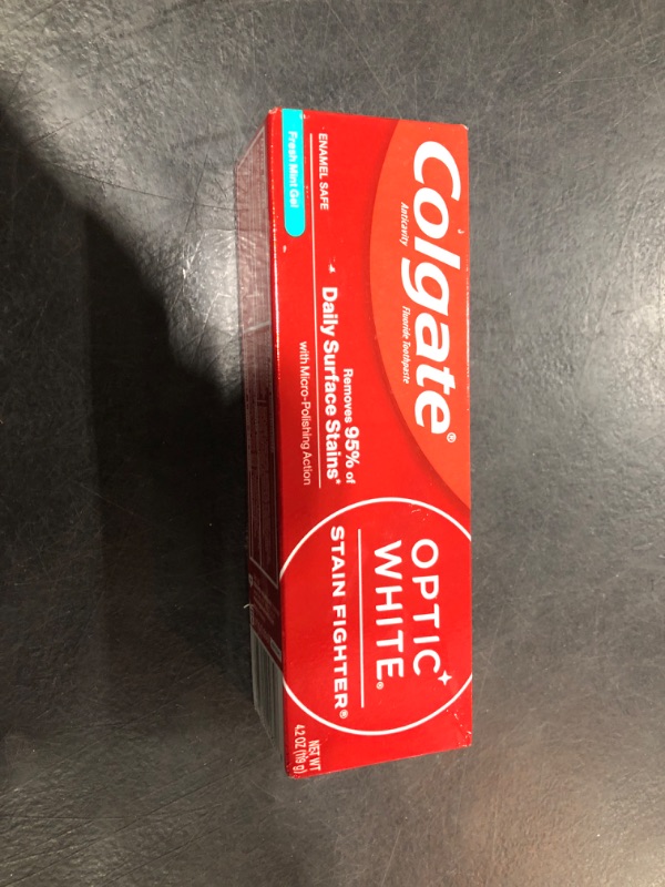 Photo 2 of Colgate Optic White Stain Fighter Teeth Whitening Toothpaste, Anticavity Fluoride Toothpaste for Whitening Teeth, Helps Remove Daily Surface Stains, Fresh Mint, 4.2 oz