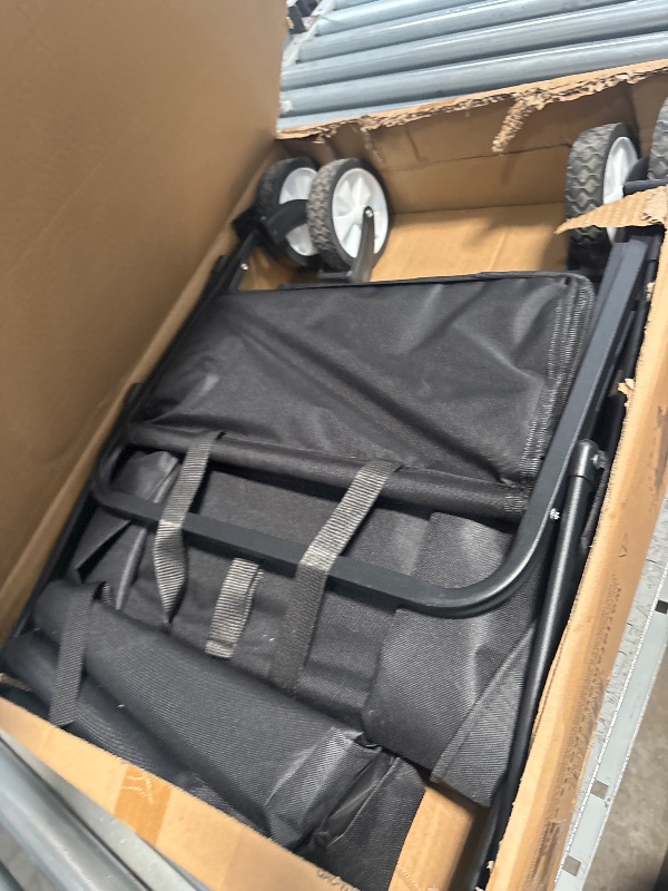 Photo 1 of ***FABRIC IS MILDLY TORN***

World Famous Sports Compact Folding Wagon