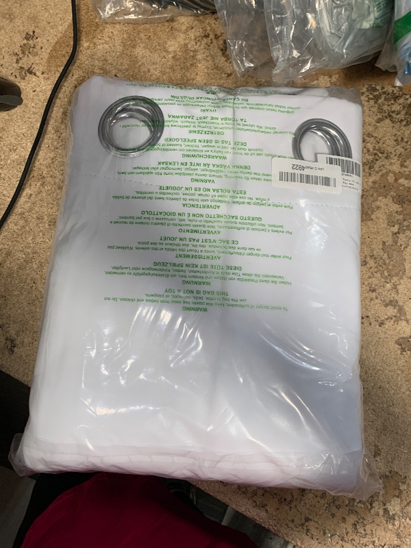 Photo 1 of NICETOWN 100% Blackout Window Curtain Panels, Cold and Full Light Blocking Drapes with Black Liner for Nursery, 84 inches Drop Thermal Insulated Draperies (White, 2 Pieces, 52 Wide Each Panel)