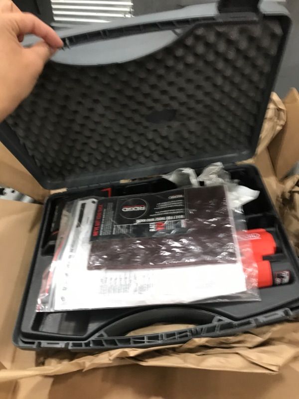 Photo 1 of RIDGID 72553 Model RP 115 Mini Press Tool and Battery Kit with 1/2" to 3/4" ProPress Press Tool Jaws, 2V Li/Ion Battery, 12V Charger, and Carrying Case , Red