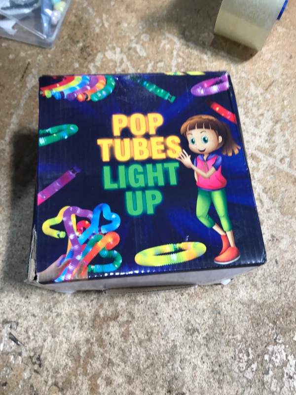 Photo 1 of 24 pcs Glow Sticks Camping Essentials for Kids, LED Light Up Pop Tubes/Bracelet Party Favors for Kids,Glow in The Dark Party Supplies,Halloween Birthday Gifts Xmas Stocking Goodie Bags Stuffers