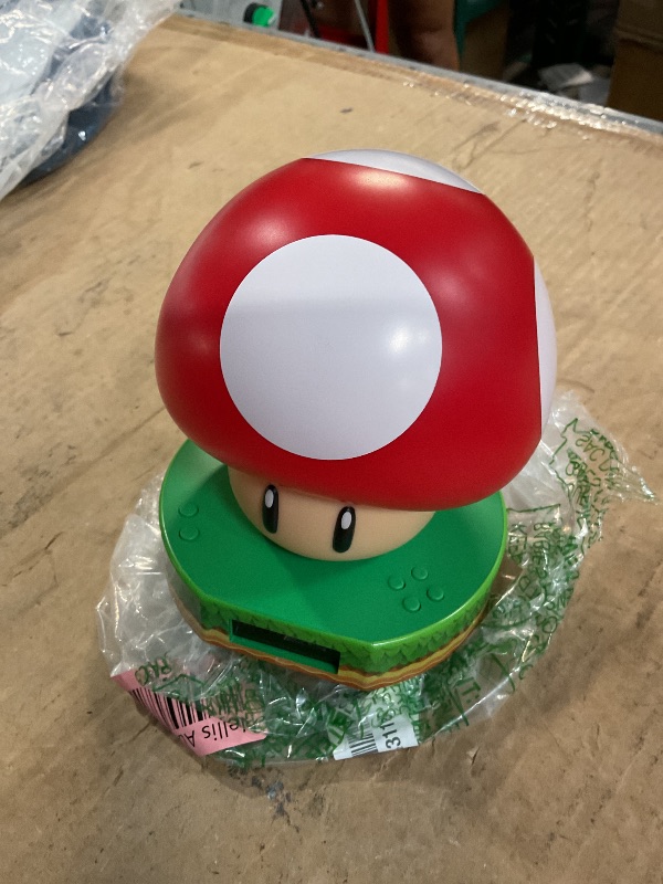 Photo 1 of (Used)  Super Mario Bros Mushroom Digital Alarm Clock with Power Up Game Sound and Night Light Glow