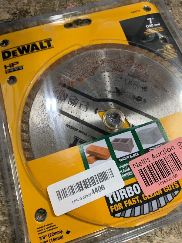 Photo 1 of ** HAS RUSTING** DEWALT Diamond Blade for Block and Brick, Dry/Wet Cutting, Continuous Rim, 7-Inch (DW4712)