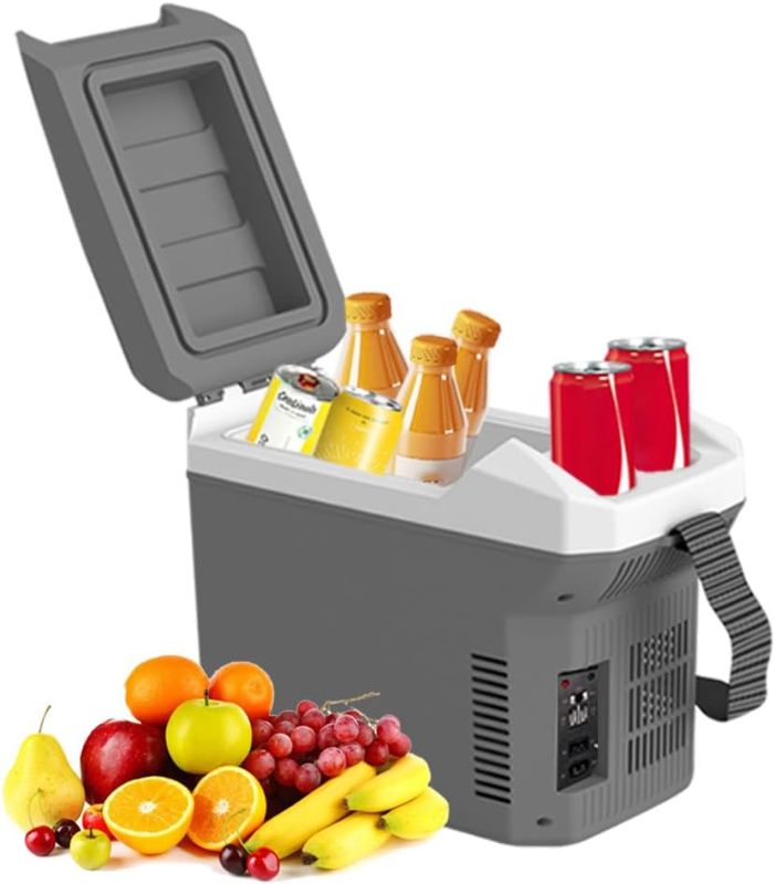 Photo 1 of **TREFAN Electric Car Cooler & Warmer Plug in Cooler with AC/DC Car Mini Fridge Portable Electric Cooler for Car/Camping/Travelling/Truck