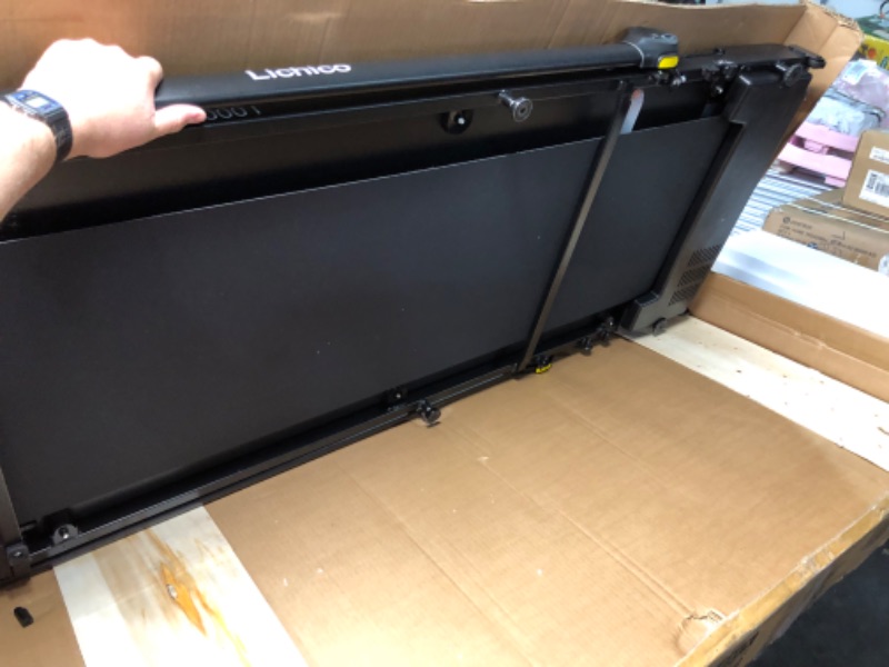 Photo 1 of ***ITEM TESTED FOR POWER, UNABLE TO TEST FURTHER***Lichico Walking Pad Under Desk Treadmill?Portable Small Treadmills for Home and Office?Super Quiet Brushless Motorized Walking Jogging Running Machine with Remote Control
