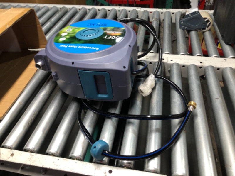 Photo 1 of ***HOSE DOESN'T RETRACT - INCOMPLETE - SEE PICTURES***
Tuzoc Retractable Garden Hose, Heavy Duty Wall-Mounted Hose Reel with 180° Swivel Bracket, Automatic Slow Return System with 10 Function Nozzle, Any Length Lock for outside Watering,Cleaning?50ft?