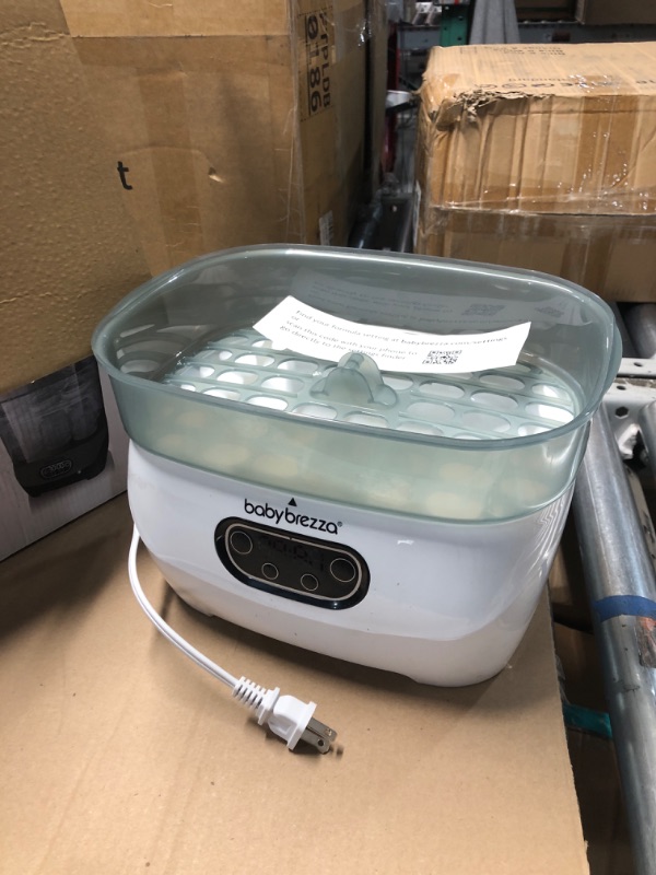 Photo 1 of Baby Brezza Bottle Sterilizer and Dryer Advanced – Electric Steam Sterilization Machine Universal Sterilizing for All Bottles: Plastic + Glass Pacifiers Breast Pump Parts - HEPA Filtration
